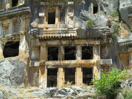 Ancient lycian Myra rock tomb ruins in Demre, Antalya, Turkeyの写真素材