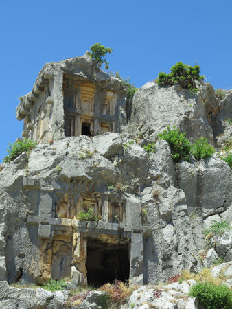 Ancient lycian Myra rock tomb ruins in Demre, Antalya, Turkeyの写真素材