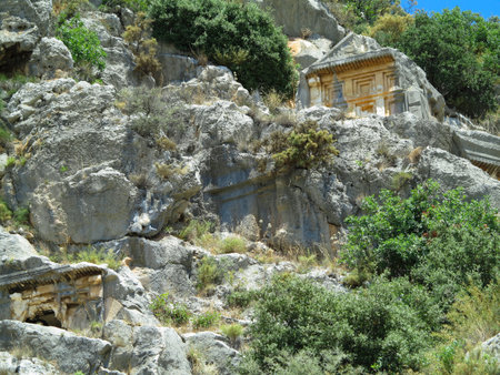Ancient lycian Myra rock tomb ruins in Demre, Antalya, Turkeyの写真素材