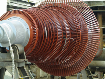 Power generator steam turbine in repair process, machinery, pipes, tubes, at an power plantの写真素材