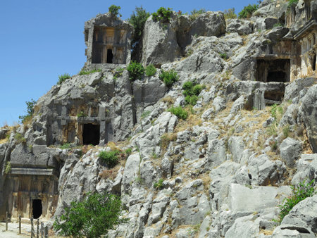 Ancient lycian Myra rock tomb ruins in Demre, Antalya, Turkeyの写真素材