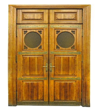 Old decorated vintage brown antique wooden door isolated over white backgroundの写真素材