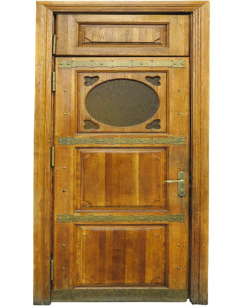 Old decorated vintage brown antique wooden door isolated over white backgroundの写真素材