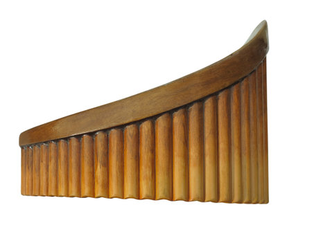 Vintage old brown wooden Pan Flute Isolated on white backgroundの写真素材