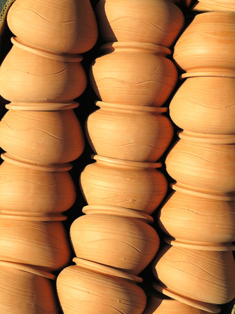 Beautiful brown handmade clay pots sold at the fair shopの写真素材