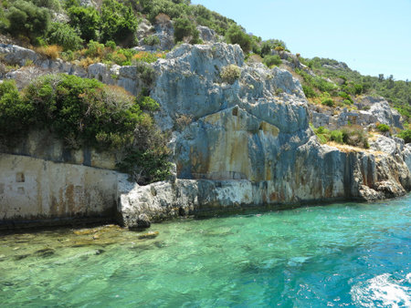 The sunken ruins on the island of Kekova Dolichiste of the ancient Lycian city of ancient Simena, was destroyed by an earthquake, rebuilt and existed until the Byzantine era. Antalya, Turkey.の写真素材