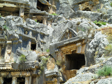 Ancient lycian Myra rock tomb ruins in Demre, Antalya, Turkeyの写真素材