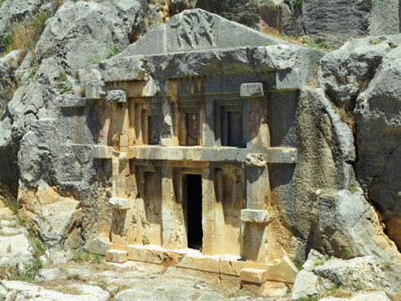 Ancient lycian Myra rock tomb ruins in Demre, Antalya, Turkeyの写真素材