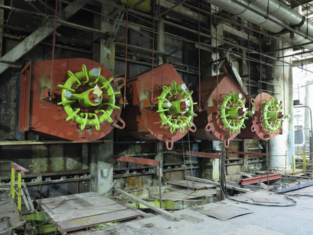 Giant gas-burners, glitter tubes, equipment, cables and piping inside of a modern industrial power plantの写真素材