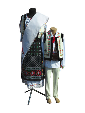 Lady and child national traditional balkanic, moldavian, romanian costumes isolated over white backgroundの写真素材