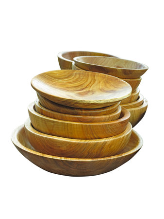 stack of wooden plates dishware isolated over white backgroundの写真素材