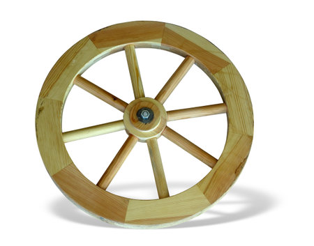 Old brown wooden wagon wheel from a cart isolated over white backgroundの写真素材