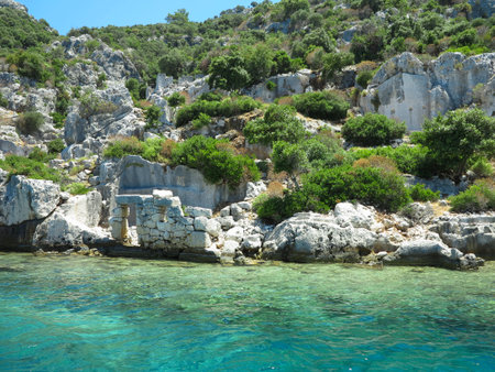 The sunken ruins on the island of Kekova Dolichiste of the ancient Lycian city of ancient Simena, was destroyed by an earthquake, rebuilt and existed until the Byzantine era. Antalya, Turkey.の写真素材