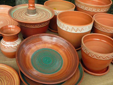 Beautiful handmade clay pots and other dishes sold at the fair shopの写真素材