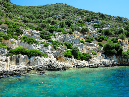 The sunken ruins on the island of Kekova Dolichiste of the ancient Lycian city of ancient Simena, was destroyed by an earthquake, rebuilt and existed until the Byzantine era. Antalya, Turkey.の写真素材