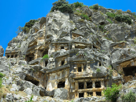 Ancient lycian Myra rock tomb ruins in Demre, Antalya, Turkeyの写真素材