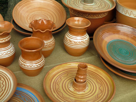 Beautiful handmade clay pots and other dishes sold at the fair shopの写真素材