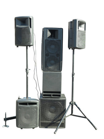 Old industrial powerful stage sound speakers isolated over white backgroundの写真素材