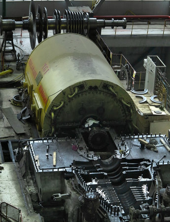 28.01.2020, Moldova, Chisinau: Power generator steam turbine in repair process, machinery, pipes, tubes, at an power plantのeditorial素材