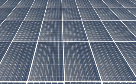 Abstract endless power solar panel on blue sky background, alternative clean green energy conceptの写真素材