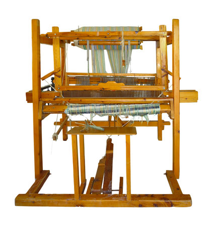 Old vintage wooden loom isolated over white backgroundの写真素材