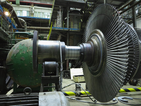 Power generator steam turbine in repair process, machinery, pipes, tubes, at an power plantの写真素材
