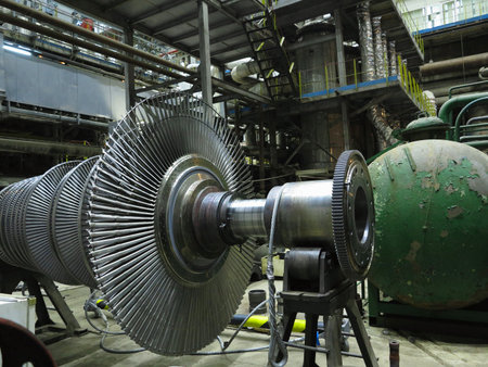Power generator steam turbine in repair process, machinery, pipes, tubes, at an power plantの写真素材