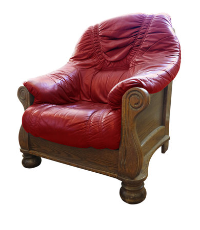 Old wooden classic leather red armchair isolated over white backgroundの写真素材