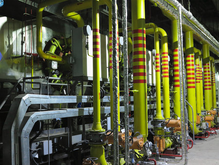 Gas yellow tubes at an industrial thermal electric power plant, night sceneのeditorial素材