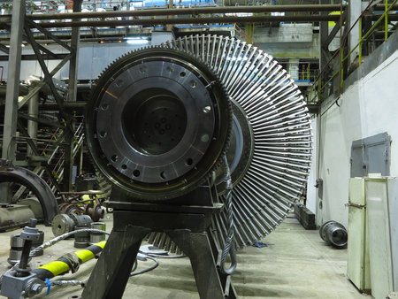 Power generator steam turbine in repair process, machinery, pipes, tubes, at an power plantのeditorial素材