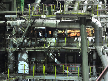 Pipes, steel tubes, steam turbine and equipment at industrial power plant, night sceneのeditorial素材