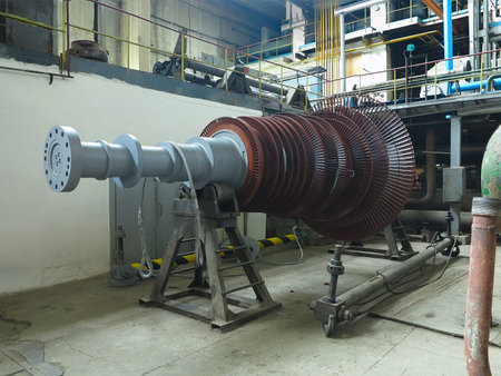 Power generator steam turbine in repair process, machinery, pipes, tubes, at an power plantのeditorial素材