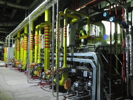 Gas yellow tubes at an industrial thermal electric power plant, night sceneのeditorial素材