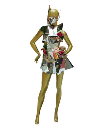 Female mannequin dressed in abstract metallic mirror clothes isolated over white background. No brand names or copyright objects.の写真素材