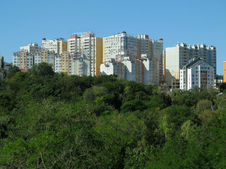 Just build new apartment houses in green forest and blue skyの写真素材