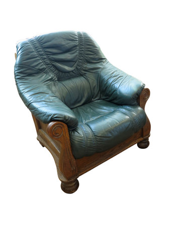 Old wooden classic leather green armchair isolated over white backgroundの写真素材