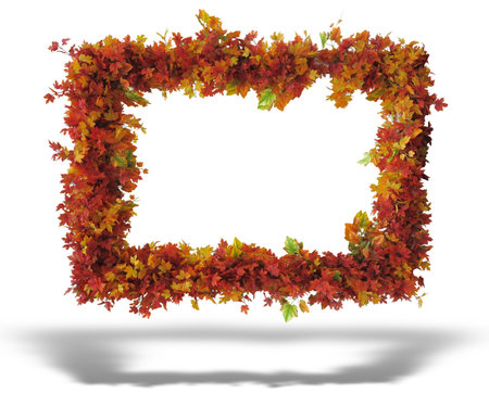 Abstract frame composed of colorful red, brown and yellow autumn leaves isolated over white backgroundの写真素材