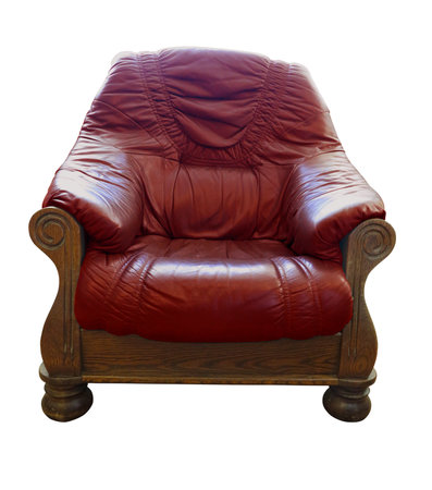 Old wooden classic leather red armchair isolated over white backgroundの写真素材