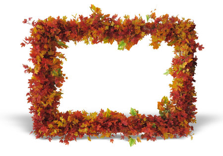 Abstract frame composed of colorful red, brown and yellow autumn leaves isolated over white backgroundの写真素材