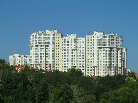 Just build new apartment houses in green forest and blue skyの写真素材