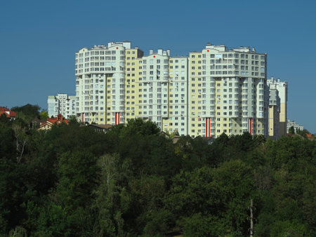 Just build new apartment houses in green forest and blue skyの写真素材