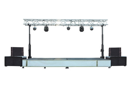 Stage with light equipment and audio sound speakers isolated over white backgrondの写真素材