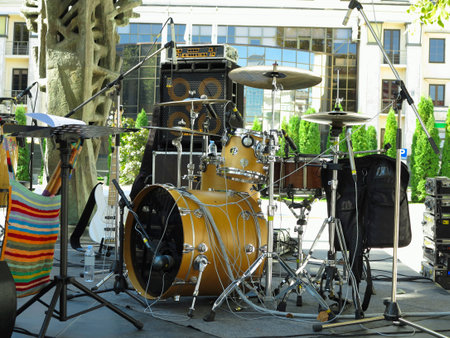 31.08.2021, Moldova, Chisinau: Festive concert stage: musical instruments, drums, amplifiers, speakers, microphones, cables.のeditorial素材