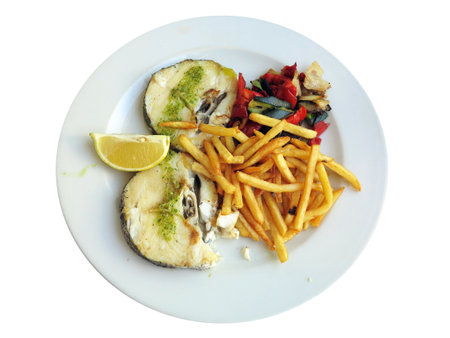 Fried fish with french fries and salad isolated over white backgroundのeditorial素材
