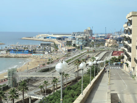 Tarragona, Spain - 06,07,2022: A view of the coast of Tarragona, in Spain, and its Passeig Maritim promenade along the Mediterranean Seaのeditorial素材
