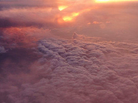 Dramatic red storm clouds. Aerial view over the clouds.の写真素材