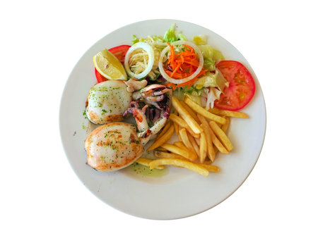 Prepared squid, french fries and salad on plate isolated over white backgroundの写真素材
