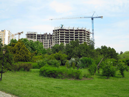 Construction of an new luxury apartment building in green areaの写真素材