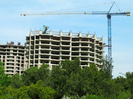 Construction of an new luxury apartment building in green areaの写真素材