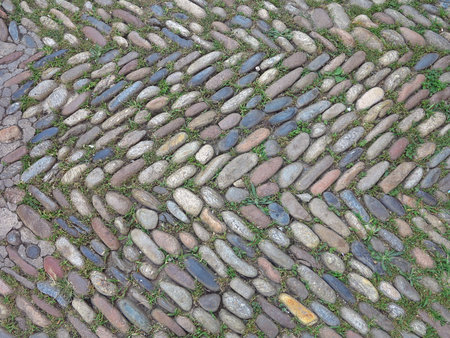 Old stone pavement road on the medieval street of Spainの写真素材